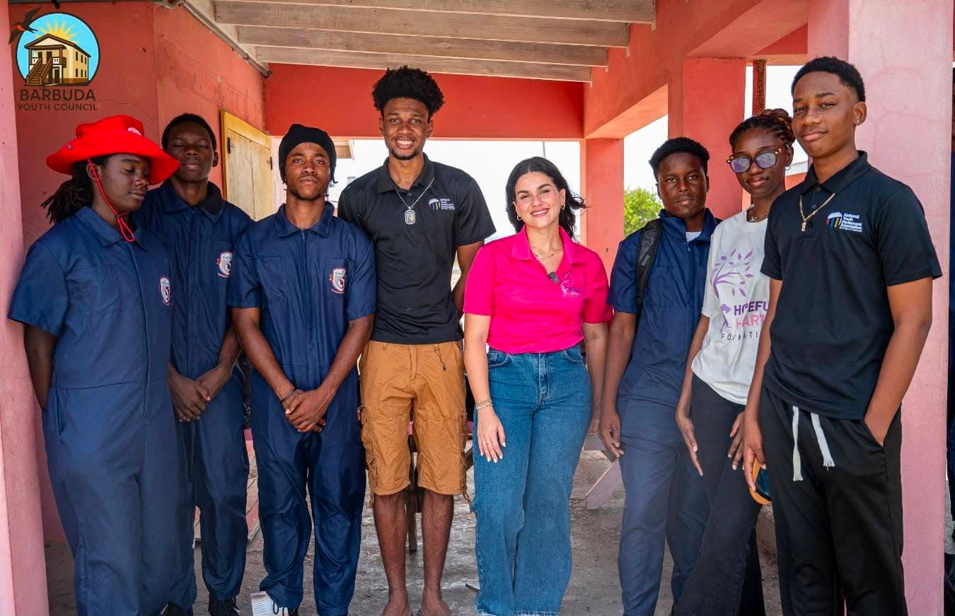 kristine in barbuda with ezekiel and other youths