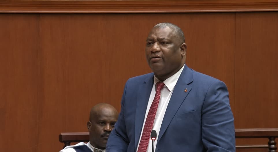 chester hughes looking strongly at the other side in parliament