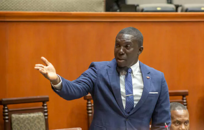 jamale pringle outstretched hand in parliament